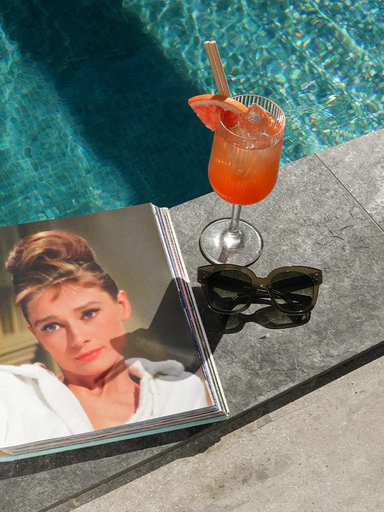 Summer and bar at Ellery Beach House Cocktail by the pool at the bar at Ellery Beach House during summer in Stockholm