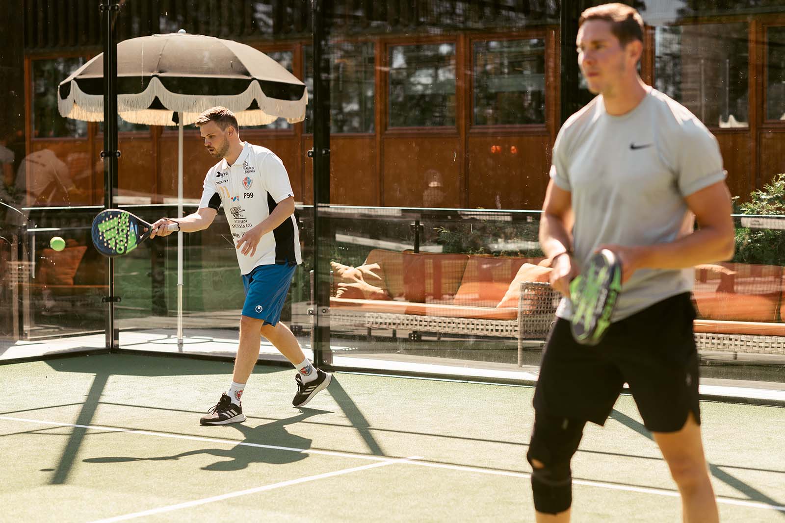 Activities for the Entire Wedding Party Wedding guests playing padel at Ellery Beach House during a wedding weekend